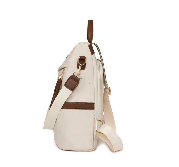 Damen-Rucksack aus Nylon mit Quaste und rückseitigem Reißverschluss