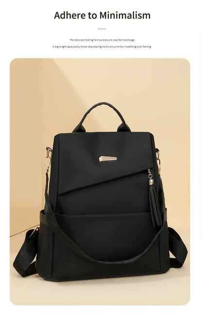 Damen-Rucksack aus Nylon mit Quaste und rückseitigem Reißverschluss