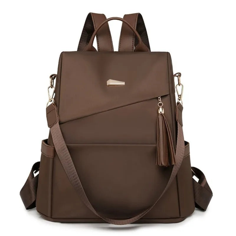 Damen-Rucksack aus Nylon mit Quaste und rückseitigem Reißverschluss