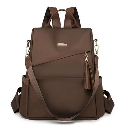 Damen-Rucksack aus Nylon mit Quaste und rückseitigem Reißverschluss