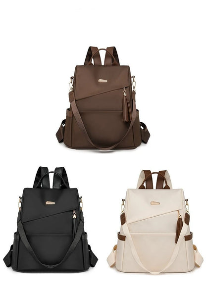 Damen-Rucksack aus Nylon mit Quaste und rückseitigem Reißverschluss